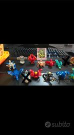 lotto 18 Bakugan + lamincards e carte magnetiche