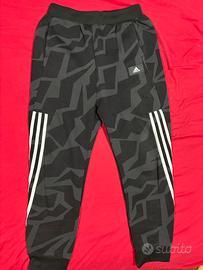 Tuta Adidas nera e bianca tg 14 anni