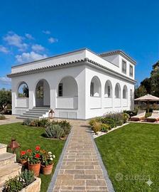 Villa con giardino