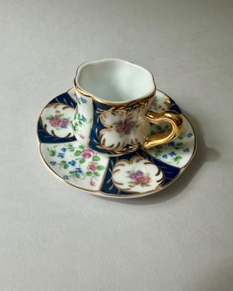 Tazzina e piattino miniatura in porcellana