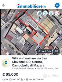 Casa da ristrutturare con cortile e magazzino