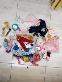 Lotto  giocattoli  bamboline vestitini e accessori