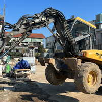 Escavatore gommato targato snodato Mecalac 10MSX