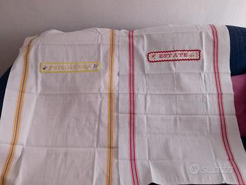 asciugamani in cotone con inserti di ricamo