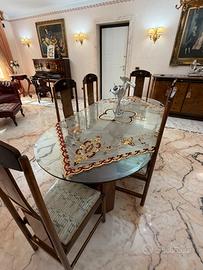 Tavolo ovale in vetro con 6 sedie in legno