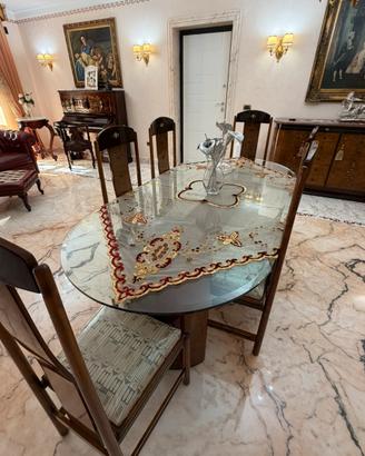 Tavolo ovale in vetro con 6 sedie in legno