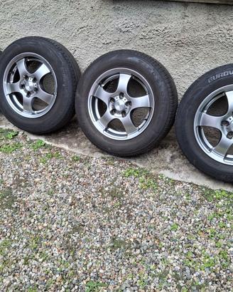 4 cerchi Dezent 15" Volkswagen Golf V con gomme