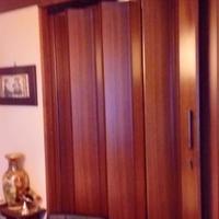 porta a soffietto in noce