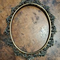 Cornice  ovale in bronzo 