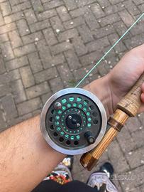 2canne da mosca + un mulinello e 2 custoda rigide