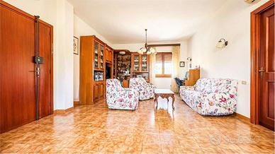 Trilocale con giardino e taverna