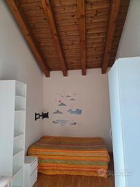 Camera singola con bagno condiviso