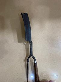 Antica piastra arricciacapelli