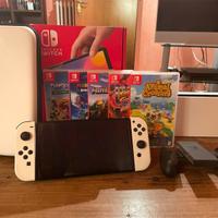 Nintendo Switch Oled + accessori + 5 giochi