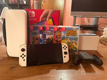 Nintendo Switch Oled + accessori + 5 giochi