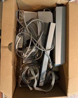 Console Nintendo Wii bianca con cavi e 2 giochi