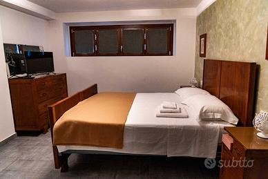 Stanza con bagno in appartamento condiviso