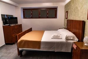 Stanza con bagno in appartamento condiviso