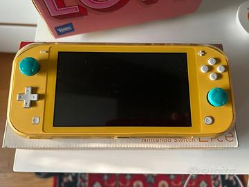 Nontendo switch lite gialla + giochi e scatola