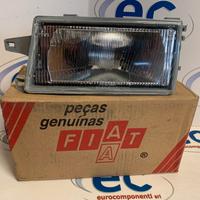 7081458 PROIETTORE SX. FIAT FIORINO