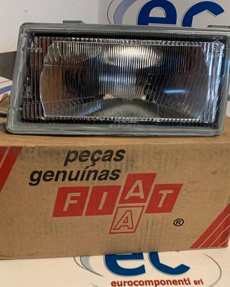 7081458 PROIETTORE SX. FIAT FIORINO