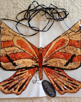 Top farfalla in paillettes
