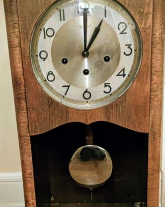 Orologio a pendolo da muro 