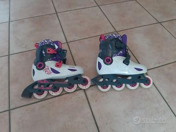 Pattini in linea da bambina n. 30-32 + protezioni
