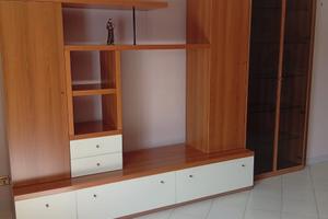 Mansarda arredata zona paletta d'oro con box