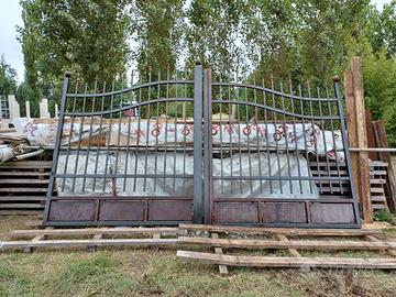 Cancello a battente in ferro pieno rivettato