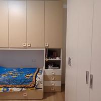 armadio a ponte e letto