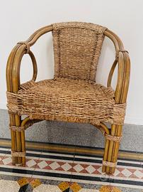 Poltrona in rattan e fibre intrecciate