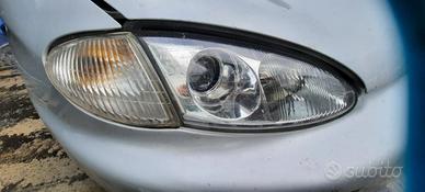 HYUNDAI COUPE TIBURON 2000 - FARO ANTERIORE DESTRO