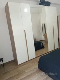 armadio con como' e comodini