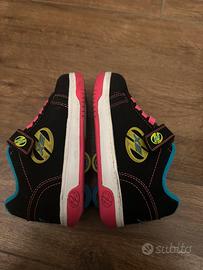 Scarpe con rotelle a strappo per bambini