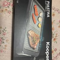 Piastra grill adatta alla cottura di pesce e carne