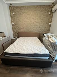 Letto contenitore matrimoniale con testiera