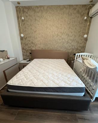 Letto contenitore matrimoniale con testiera