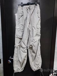 Pantaloni Criminal si seconda mano 