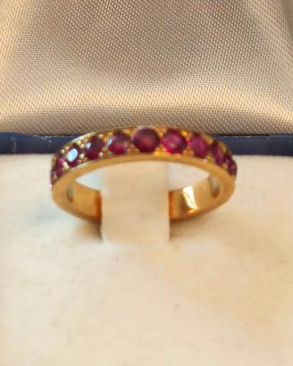 ANELLO RIVIERA IN ORO GIALLO DI RUBINI