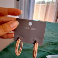Orecchini Parfois ovali color ecrù decori argentat