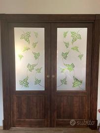 Porta scorrevole a due ante