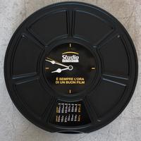 Orologio pubblicitario cinema Studio Universal 