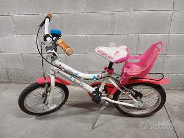 Bici Bambina con seggiolino posteriore
