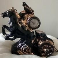 Orologio vintage con biga a due cavalli