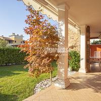 BILOCALE CON GIARDINO IN RESIDENCE CON PISCINA