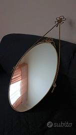 Specchio ovale vintage in ottone dorato
