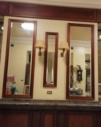  specchio vintage ,con cornice in piuma di moga