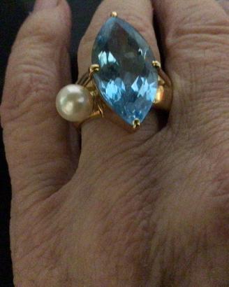 Anello oro 18 topazio azzurro eperla