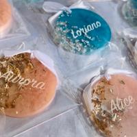 Ricordini/segnaposto personalizzati in resina. 